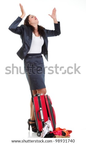 Full length of young business woman to late mishap misadventure pulling red travel bag clock isolated on white background