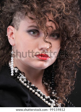 Girl - Ear super piercing woman dark hair natural brown-haired black background