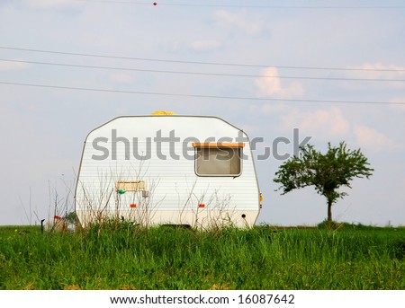 Camping trailer on a meadow