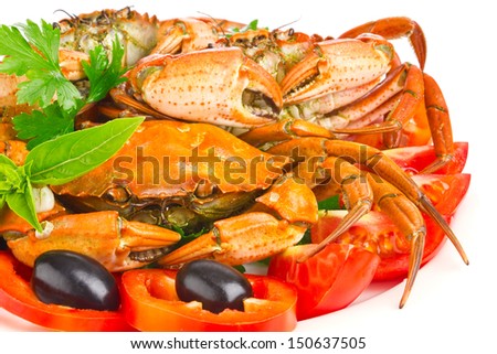 fresh crab with vegetable and greens isolated on white background