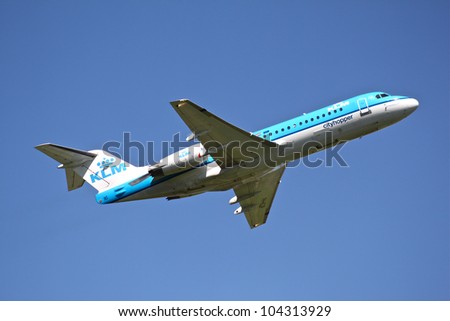 BRUSSELS - MAY 25: Fokker 70 of KLM taking off from Brussels Airport in Brussels, BELGIUM on May 25, 2012. KLM is the flag carrier airline of the Netherlands.