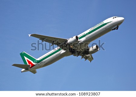 BRUSSELS - MAY 25: An Alitalia Airbus A321-112 approaching Brussels Airport in Brussels, BELGIUM on May 25, 2012. AlItalia is a flag carrier airline of Italy and one of the biggest airlines in Europe.