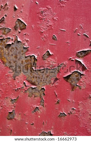 A background texture of red peeling paint and rust.