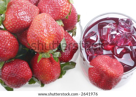 overhead view of strawberry and red drink