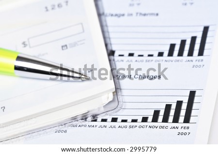 Check book on top of the gas billing statement