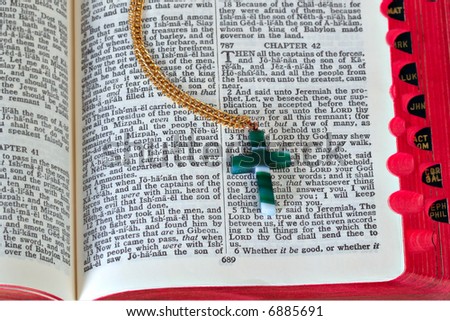 Jade Cross on Open Bible, Shallow DOF