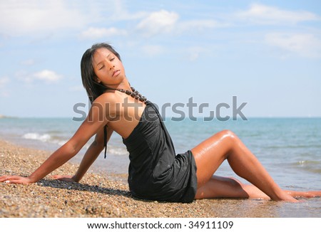 Healthy Natural Looking Young African American at Beach Eye Closed