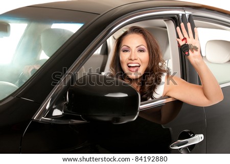 Joyful Asian Female Driver Look Out of Car Window Holding Keys