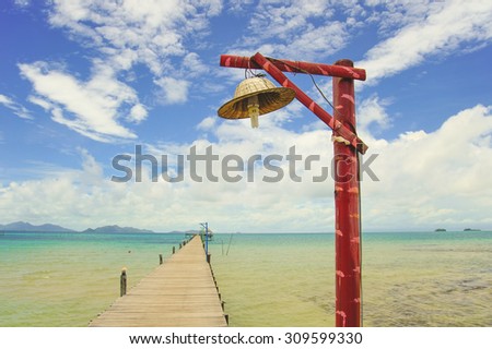 Lamp on Wooden pier, Summer, Travel, Vacation and Holiday concept - Wooden pier in Kho mak, Thailand