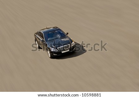 a big car at speed - See similar images of this \
