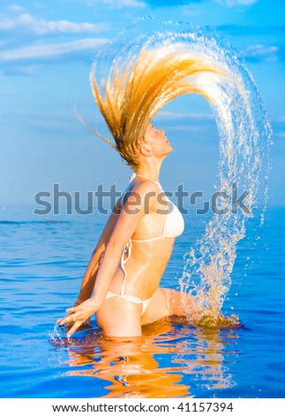 woman hair splash in water