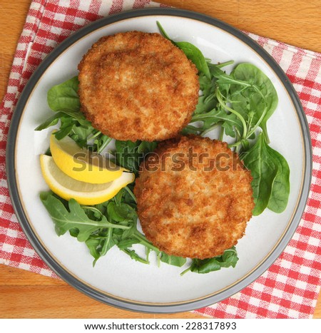 Cod fishcakes served with a rocket, spinach and watercress salad.