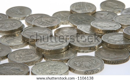 Scattered UK Pound coins