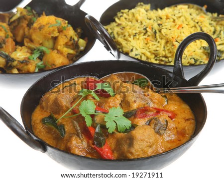 Lamb korma with vegetable curry and rice