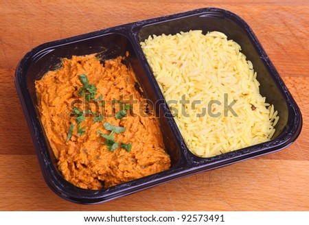 Indian chicken tikka masala curry with rice ready meal