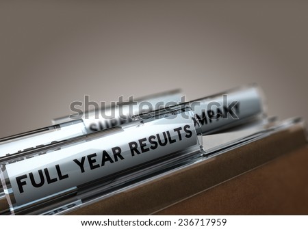 Folder tab with the text full year results with focus on the word and blur effect. Concept image for financial results.