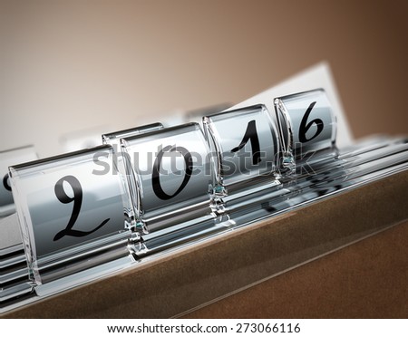 File tab with focus on 2016 year, beige background. Image concept for illustration of deadline in  two thousand sixteen.