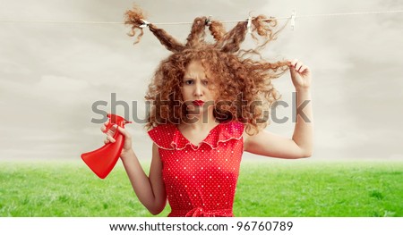 Confused funny girl with spray can. Computer art. Tonality is added/Hair trouble