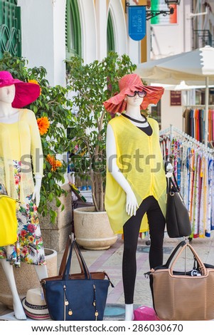 VILA REAL DE SANTO ANTONIO, PORTUGAL - JUNE 9 2015.  A mannequin outside one of the many boutiques on the high street of the pretty coastal Algarve town of Vila Real de Santo Antonio.