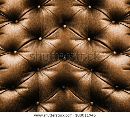 brown leather texture of sofa closeup shot