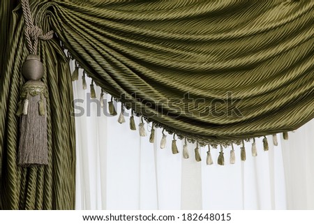 green curtain with golden pattern and decoration