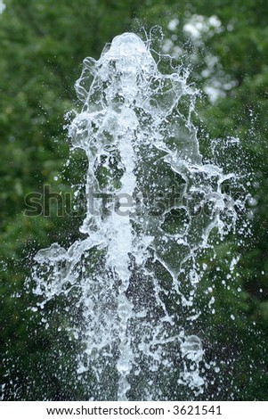 fragment of fountain water drops in the air