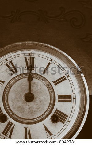 Antique Clock Face in sepia tone.