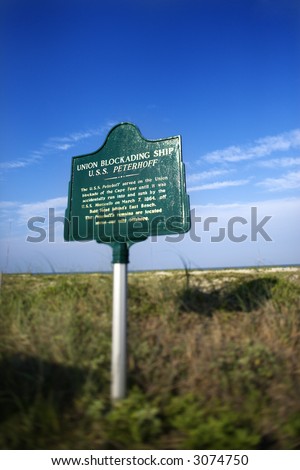 Historical marker on beach on Bald Head Island, North Carolina.