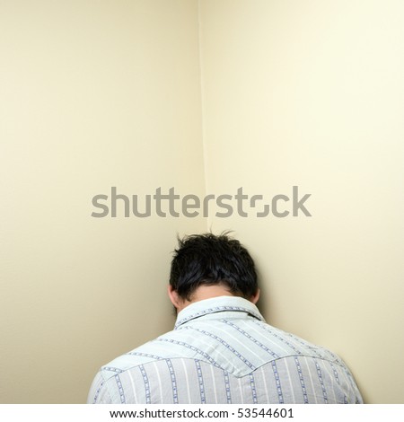 Young Man Standing With Head In Corner. Stock Photo 53544601 : Shutterstock