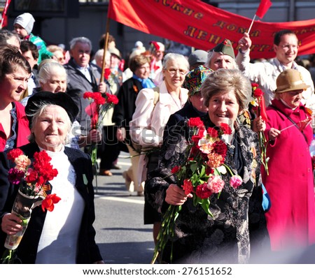 St. Petersburg - MAY 9: The parade dedicated to Victory Day on Nevsky Prospect, involved veterans of the Great Patriotic War and the young people, May 9, 2012, St. Petersburg, Russia.
