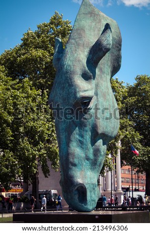 LONDON, UK - JUNE 08, 2014: Huge horse\'s head sculpture by artist Nic Fiddian-Green towering over London\'s Marble Arch area.
