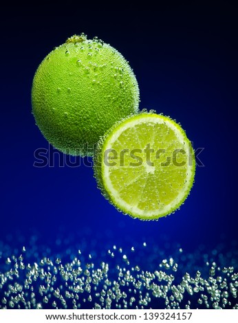 Beautiful lime close-up photo with carbon dioxide bubbles