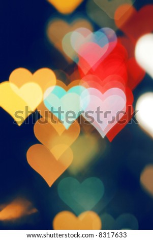 Blurred valentine background with heart-shaped highlights.