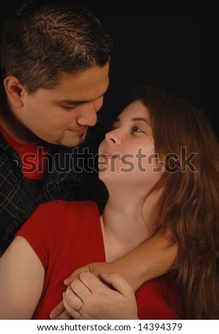 attractive spanish and caucasian ethnic mix engaged couple