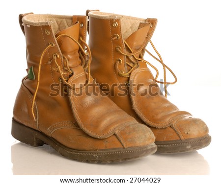 Worn Work Boots Or Safety Boots Isolated On White Background Stock ...