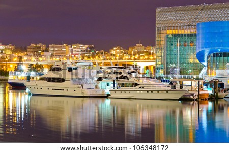 Night view at the marina with luxury yachts in Vancouver