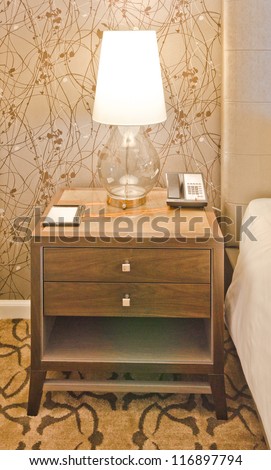 Bedroom cabinet, furniture with table lamp.