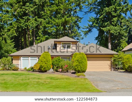 Big custom made double doors garage luxury house in the suburbs of Vancouver, Canada.