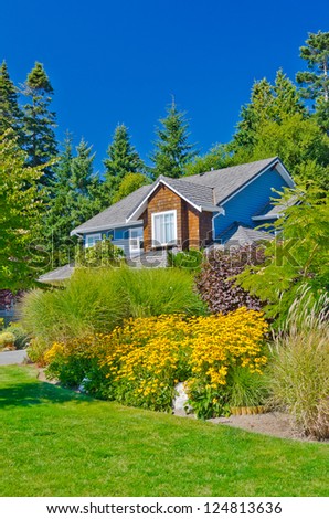 Big house with great front yard landscape design in the suburbs of Vancouver, Canada.