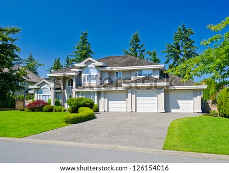 Big custom made with triple doors garage luxury house in the suburbs of Vancouver, Canada.