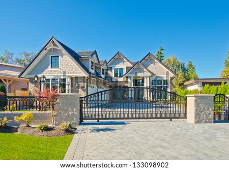 Big custom made luxury house behind the gates in the suburbs of Vancouver, Canada.