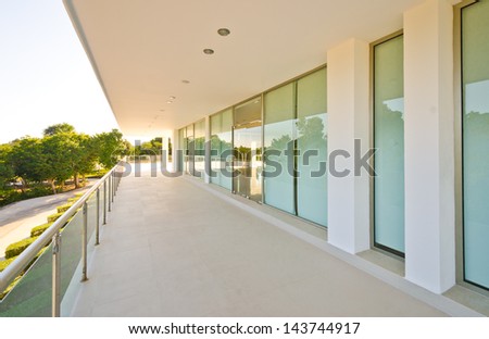 Perspective of the modern glass and steel balcony, deck, promenade railing. Exterior, interior design.