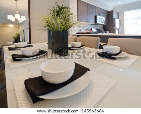 Nicely decorated and served living ( lunch ) room table with the coffee set. Intrerior design.