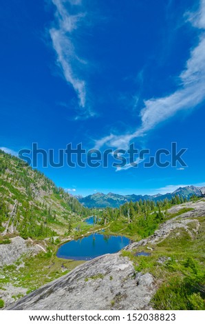 Astonishing view at Mount Baker lands and wilderness with Bagley lake. North America. Vertical.