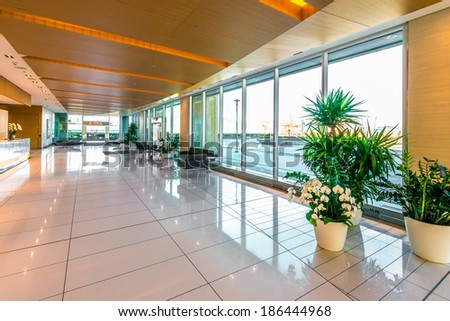 Lounge area. Modern lobby, hallway  of the five stars luxury hotel, business center in Vancouver, Canada. Interior design. Vertical.