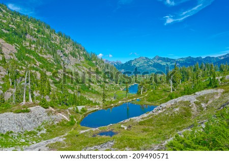 Gorgeous view at the valley with lakes at mountain lands and wilderness. North America.
