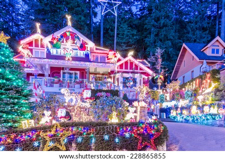 Big luxury house decorated and lighted for Christmas and for New Year Eve at Night at Vancouver, Canada.