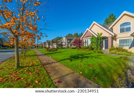 Nice and comfortable neighborhood in a fall, autumn time. Some homes in the suburbs of the North America. Canada.