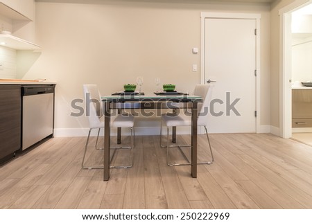 Nicely decorated and served living, lunch, dining room table. Interior design.