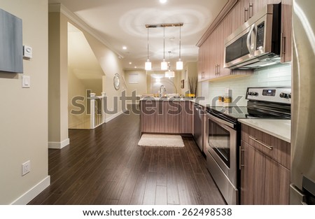 Luxury nicely decorated modern kitchen. Interior design of a brand new house.